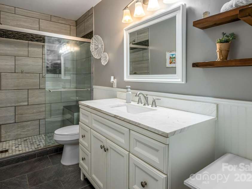 19 Forge Drive, Mills River, NC 28759.  MLS# CAR4289145, YatesRealty ID 33856. Renovated Full Bathroom