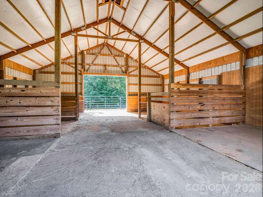 271 Collinsville Road, Columbus, NC 28722.  MLS# CAR4391485, YatesRealty ID 33858. Inside barn