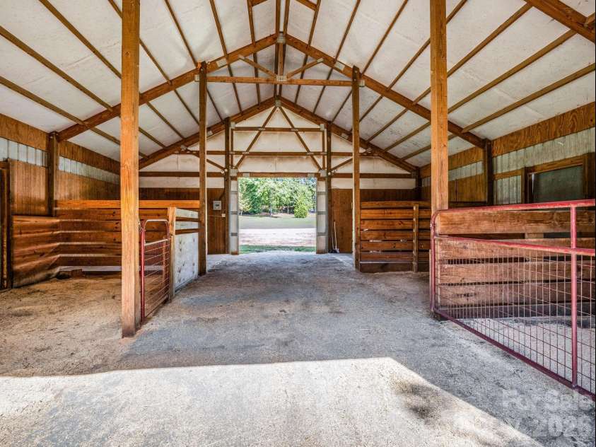 271 Collinsville Road, Columbus, NC 28722.  MLS# CAR4391485, YatesRealty ID 33858. Inside barn