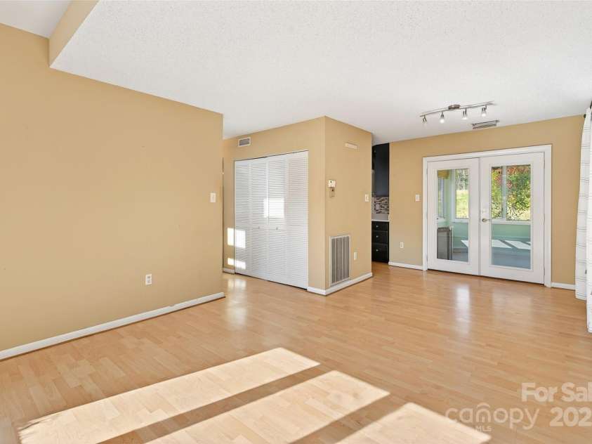 3B Lynx Drive, Black Mountain, NC 28711.  MLS# CAR4292052, YatesRealty ID 33858. Open Living Room and Dinning Room