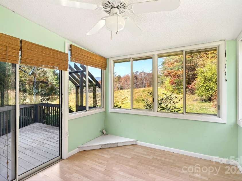 3B Lynx Drive, Black Mountain, NC 28711.  MLS# CAR4292052, YatesRealty ID 33858. Sunroom with lots of privacy Mtn Views