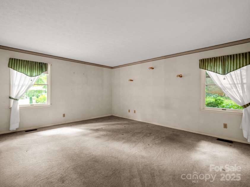 845 Greenwood Drive, Hendersonville, NC 28791.  MLS# CAR4290151, YatesRealty ID 33859. Another view of primary bedroom