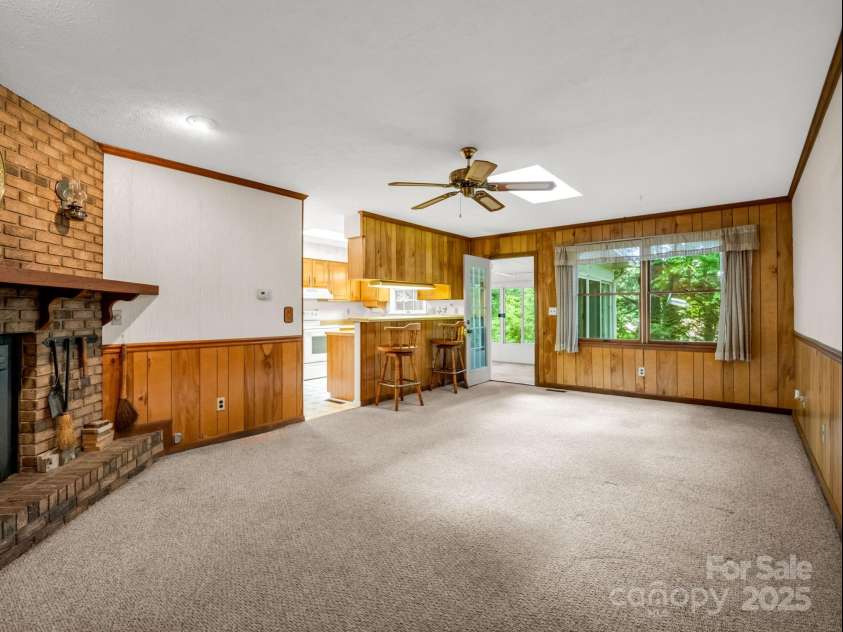 845 Greenwood Drive, Hendersonville, NC 28791.  MLS# CAR4290151, YatesRealty ID 33859. Family room has plenty of natural light