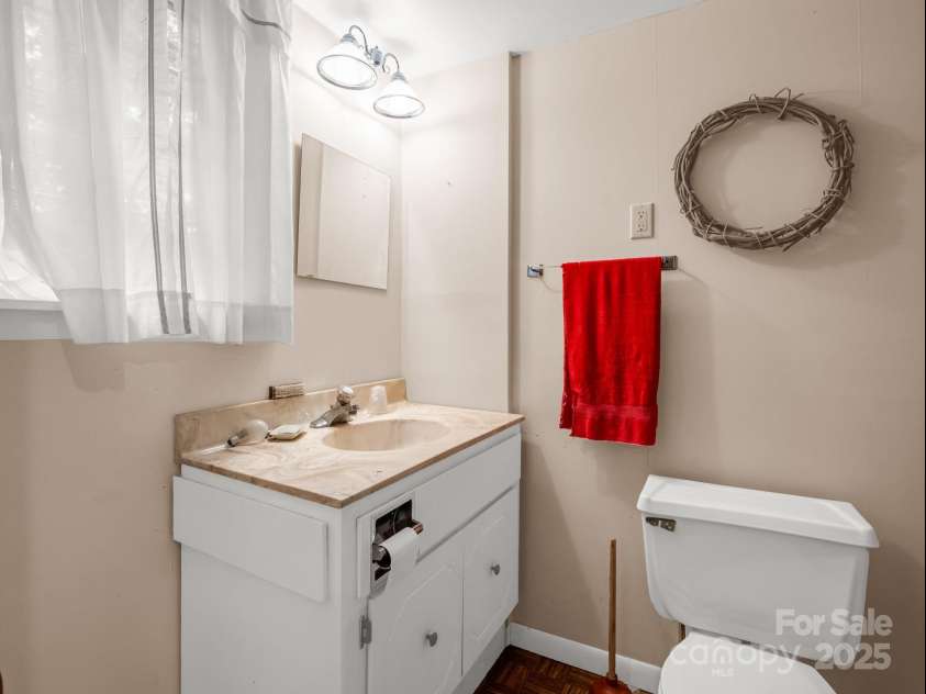 845 Greenwood Drive, Hendersonville, NC 28791.  MLS# CAR4290151, YatesRealty ID 33859. Full bathroom in basement