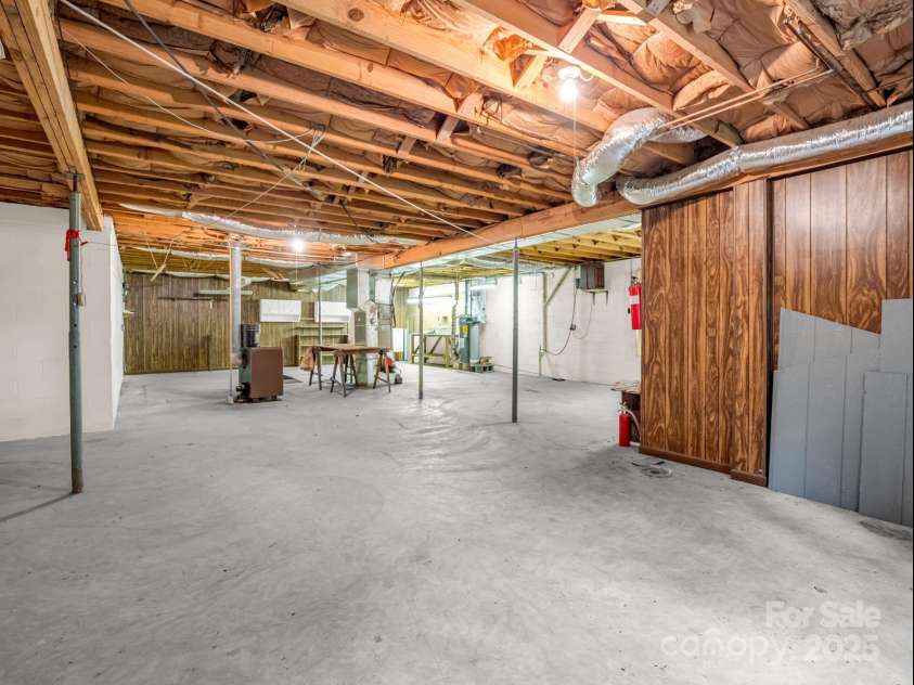 845 Greenwood Drive, Hendersonville, NC 28791.  MLS# CAR4290151, YatesRealty ID 33859. Full unfinished basement