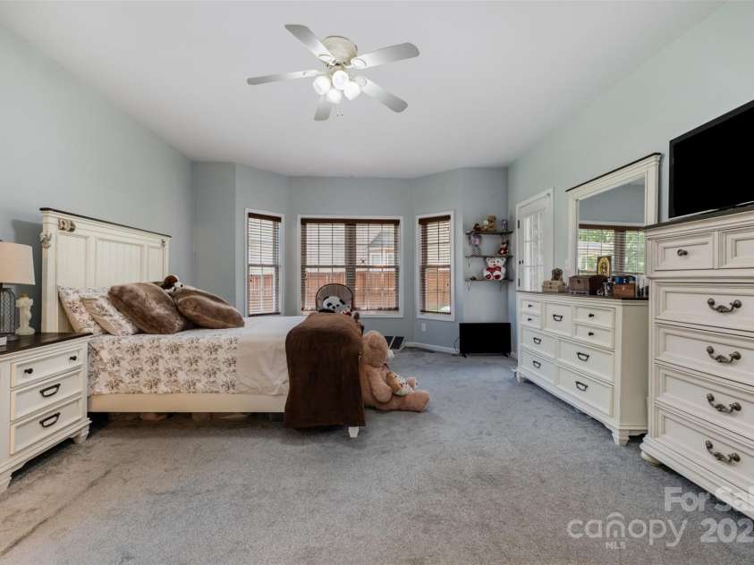 9319 Arbor Creek Drive, Charlotte, NC 28269.  MLS# CAR4287150, YatesRealty ID 33869. Primary Bedroom