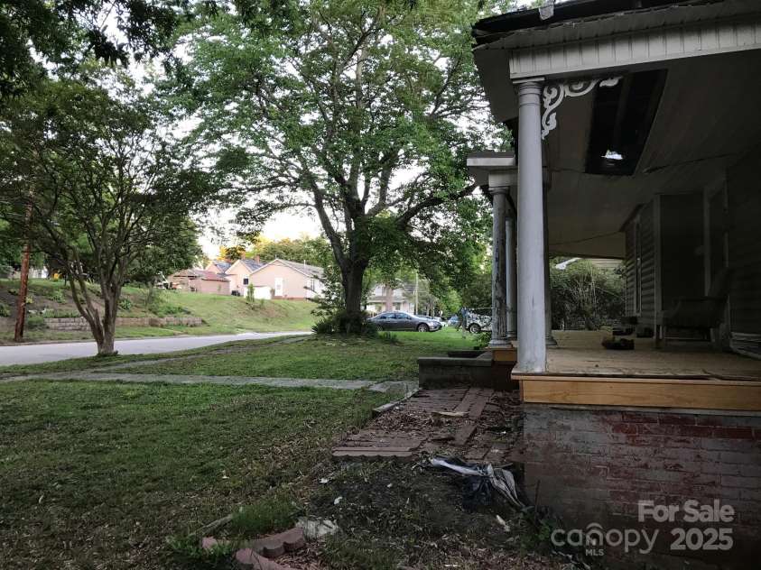 613 5th Street, Spencer, NC 29159.  MLS# CAR4240935, YatesRealty ID 3387. Right side of front porch