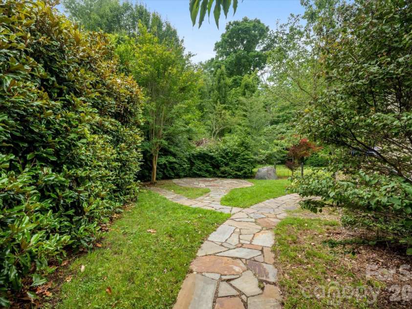115 Barton Road, Brevard, NC 28712.  MLS# CAR4392089, YatesRealty ID 33880. Back Yard