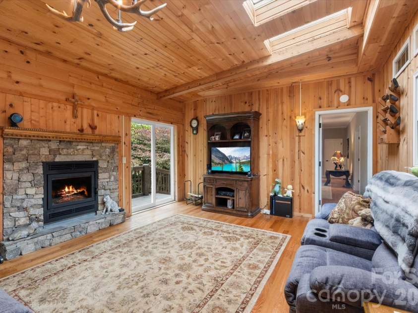 115 Barton Road, Brevard, NC 28712.  MLS# CAR4392089, YatesRealty ID 33880. Cabin Inspired Sunroom