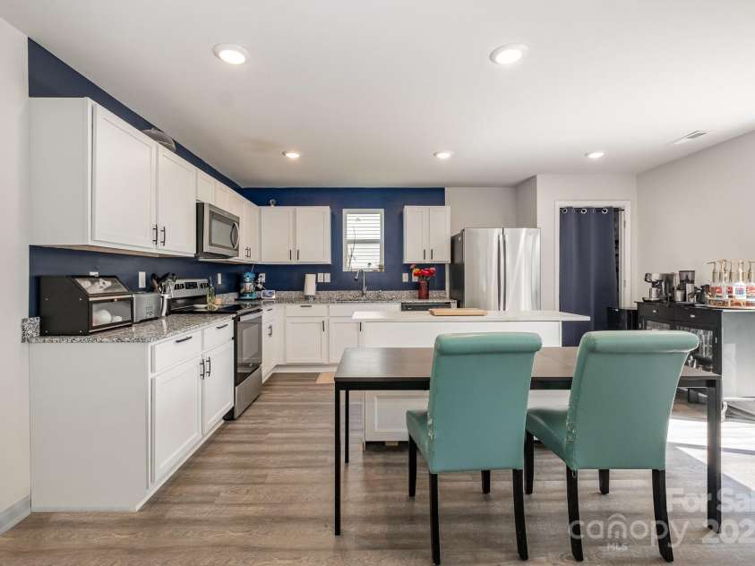 1478 Cannan Mountain Drive, Newton, NC 28658.  MLS# CAR4276775, YatesRealty ID 33880. Kitchen and dining area