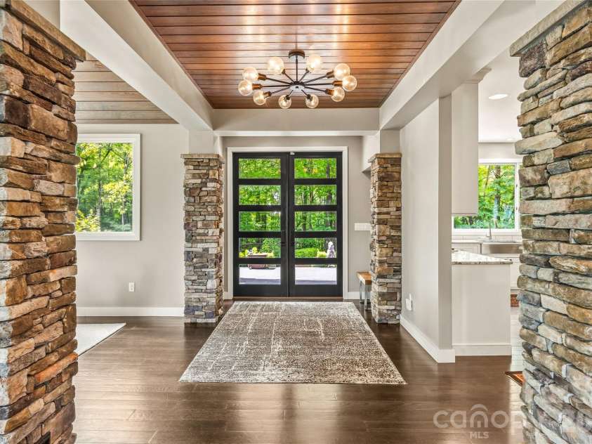 233 Tanglewood Lane, Saluda, NC 28773.  MLS# CAR4393115, YatesRealty ID 33883. Custom Stone Work Foyer