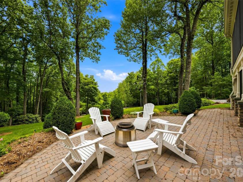 233 Tanglewood Lane, Saluda, NC 28773.  MLS# CAR4393115, YatesRealty ID 33883. Firepit area on back patio