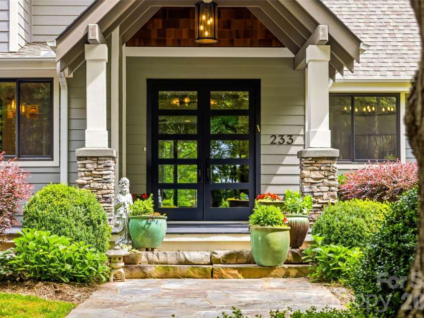233 Tanglewood Lane, Saluda, NC 28773.  MLS# CAR4393115, YatesRealty ID 33883. Front Stoop