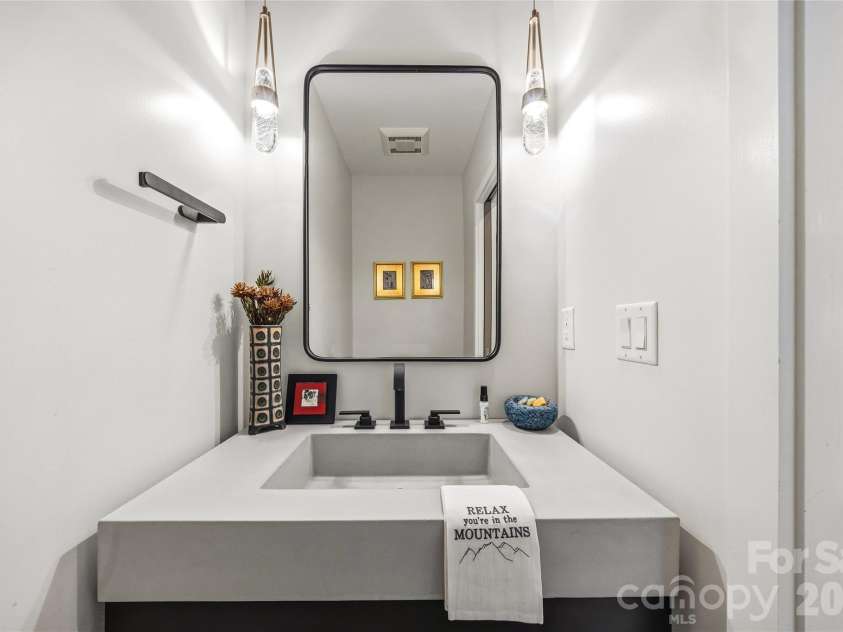 233 Tanglewood Lane, Saluda, NC 28773.  MLS# CAR4393115, YatesRealty ID 33883. Main level powder Room
