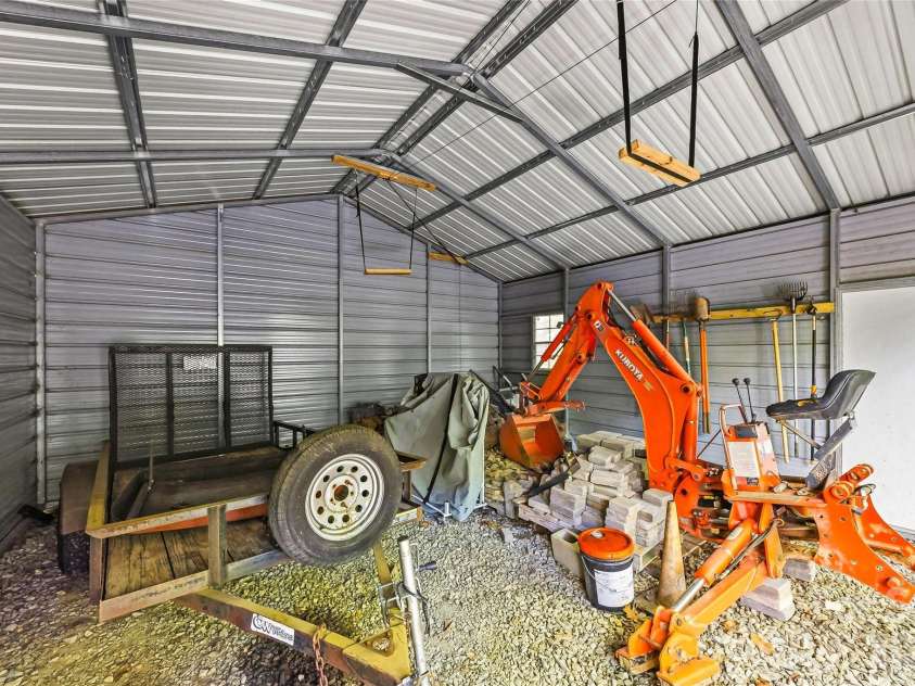 233 Tanglewood Lane, Saluda, NC 28773.  MLS# CAR4393115, YatesRealty ID 33883. Storage Shed inside