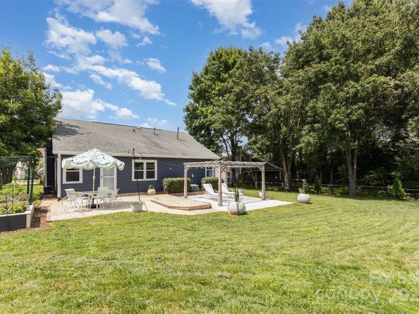 7308 Barn Stone Drive, Charlotte, NC 28227.  MLS# CAR4278388, YatesRealty ID 33885. Lot was graded and landscaped