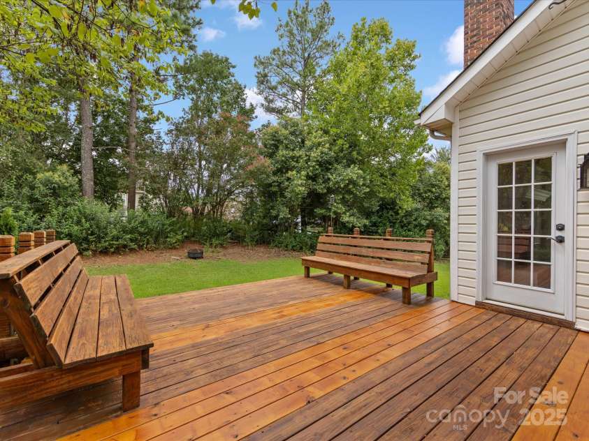 12316 Heritage Hills Lane, Charlotte, NC 28269.  MLS# CAR4285911, YatesRealty ID 33886. Deck access from the family room
