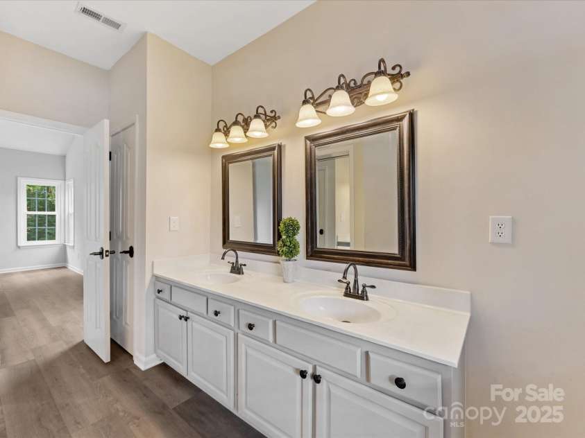 12316 Heritage Hills Lane, Charlotte, NC 28269.  MLS# CAR4285911, YatesRealty ID 33886. Primary bath with walk in closet (not shown)