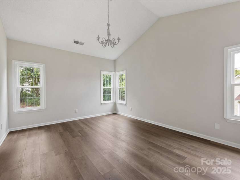 12316 Heritage Hills Lane, Charlotte, NC 28269.  MLS# CAR4285911, YatesRealty ID 33886. Primary bedroom off of the family room