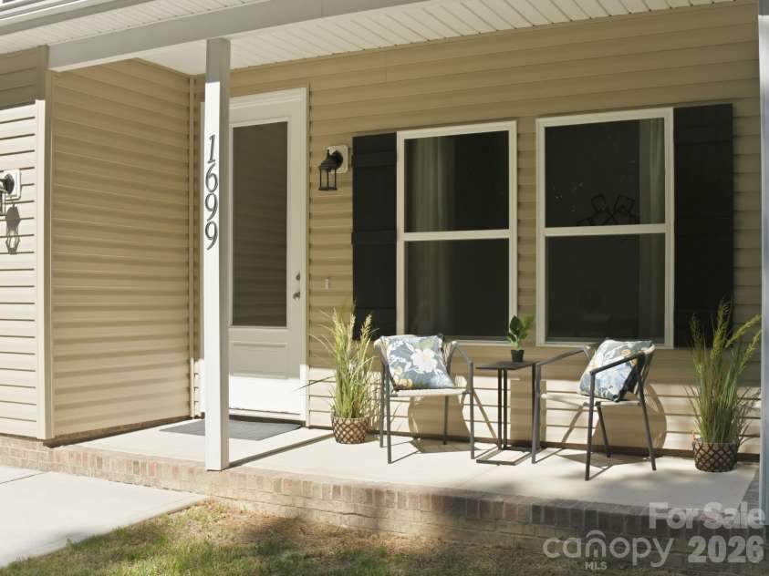 1699 Mission Oaks Street, Kannapolis, NC 28083.  MLS# CAR4385289, YatesRealty ID 33886. Relax on your Covered Front Porch