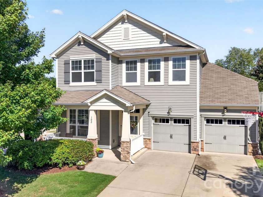 103 Cranbrook Lane, Mooresville, NC 28117.  MLS# CAR4392478, YatesRealty ID 33887. Charming 3-bedroom, 2.5-bath home on a desirable corner lot with exceptional outdoor living.