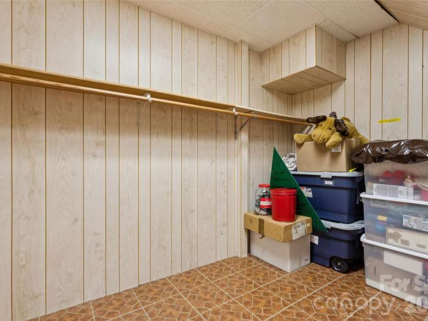 7935 Altacrest Drive, Concord, NC 28027.  MLS# CAR4395128, YatesRealty ID 33889. Storage in basement