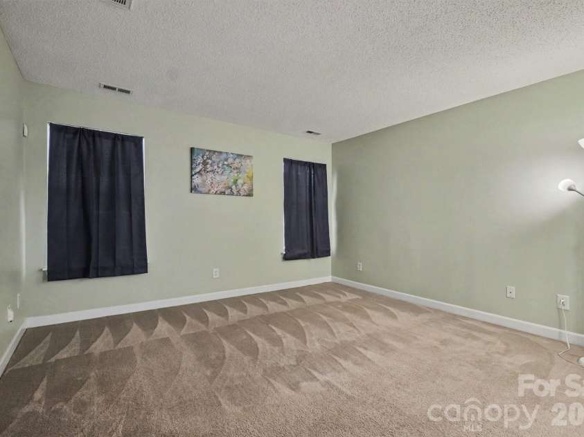 9229 Simonton Drive, Charlotte, NC 28269.  MLS# CAR4394490, YatesRealty ID 33890. Primary Bedroom