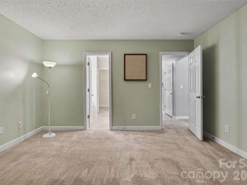 9229 Simonton Drive, Charlotte, NC 28269.  MLS# CAR4394490, YatesRealty ID 33890. Primary Bedroom 