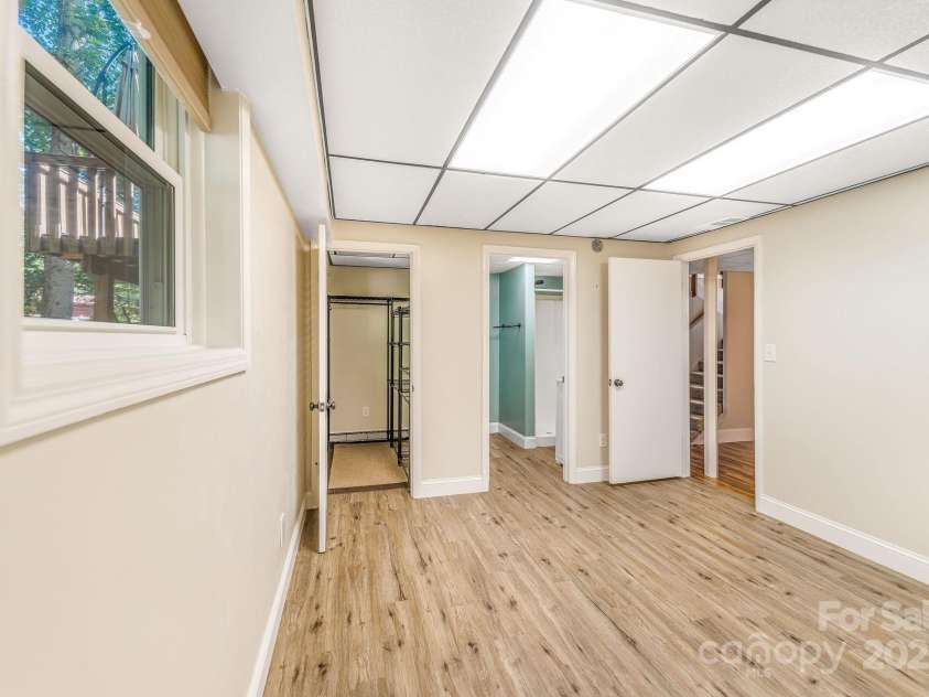 87 Crows Nest Road, Hendersonville, NC 28791.  MLS# CAR4292116, YatesRealty ID 33892. Downstairs bonus room/3rd bedroom