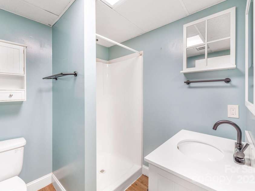 87 Crows Nest Road, Hendersonville, NC 28791.  MLS# CAR4292116, YatesRealty ID 33892. Full bathroom on lower level