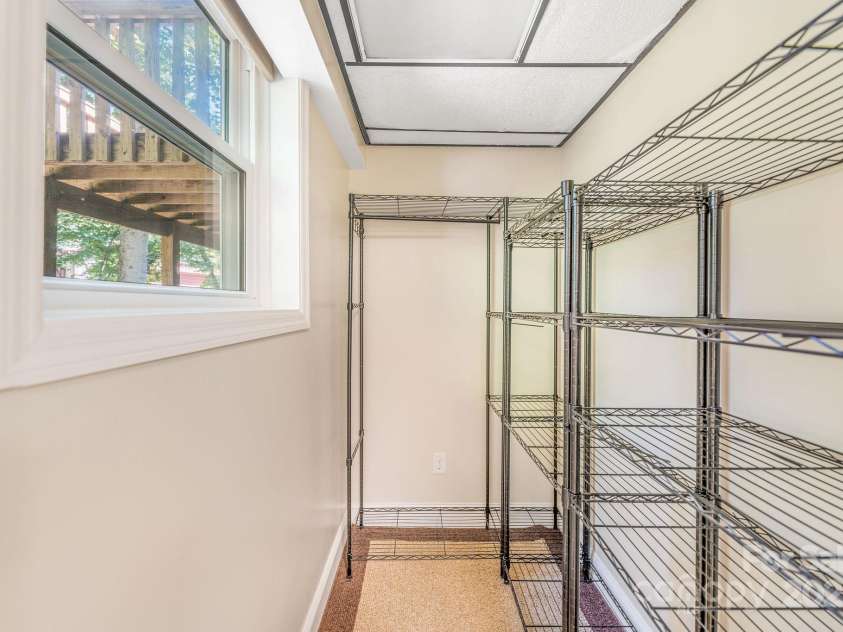 87 Crows Nest Road, Hendersonville, NC 28791.  MLS# CAR4292116, YatesRealty ID 33892. Walk in closet on lower level
