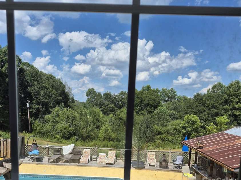 3368 Plateau Road, Newton, NC 28658.  MLS# CAR4285989, YatesRealty ID 33893. View from flex room off primary bedroom