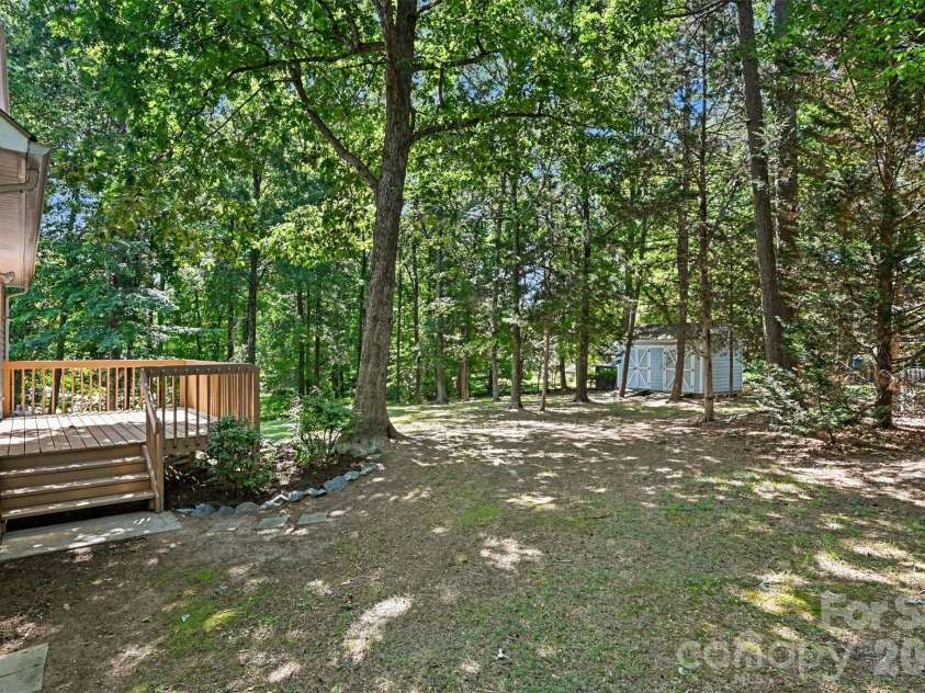 9624 Forest Drive, Charlotte, NC 28216.  MLS# CAR4392664, YatesRealty ID 33894. .5 Acre Lot w Large Storage Shed