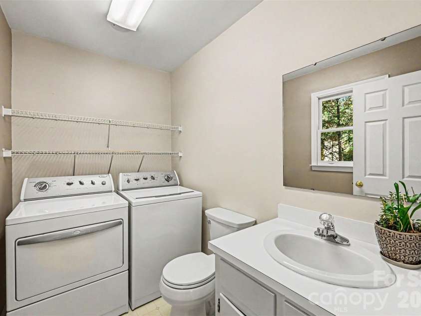 9624 Forest Drive, Charlotte, NC 28216.  MLS# CAR4392664, YatesRealty ID 33894. Main Level Laundry w Half Bath
