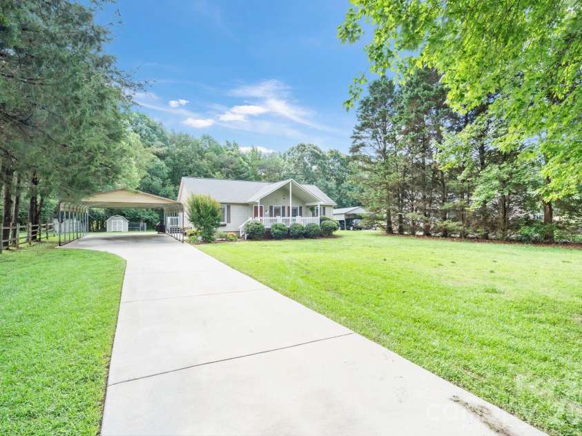 6168 King Wilkinson Road, Denver, NC 28037.  MLS# CAR4395555, YatesRealty ID 33896. Long driveway allows for ample parking