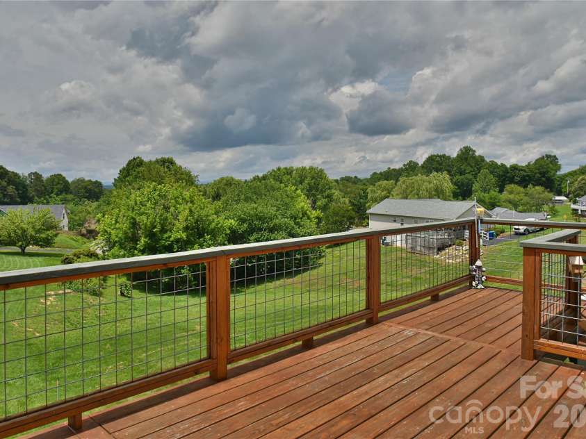 222 Erwin Hills Road, Asheville, NC 28806.  MLS# CAR4388714, YatesRealty ID 33898. Back deck long range view