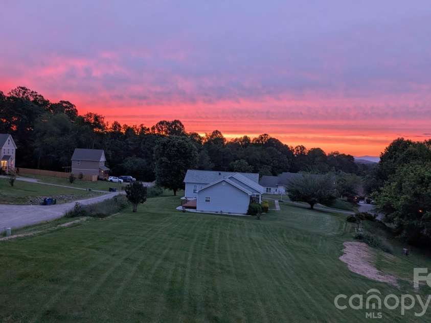 222 Erwin Hills Road, Asheville, NC 28806.  MLS# CAR4388714, YatesRealty ID 33898. Back deck sunsets
