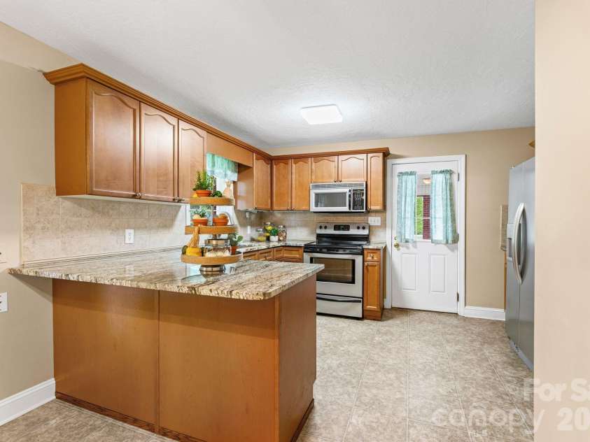 301 Milling Road, Mocksville, NC 27028.  MLS# CAR4398389, YatesRealty ID 33907. 
