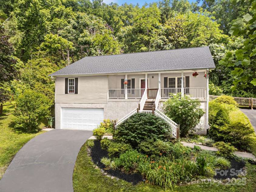 73 Waters Road, Asheville, NC 28805.  MLS# CAR4272719, YatesRealty ID 33907. 73 Waters offers 360° privacy and serenity in coveted Haw Creek.