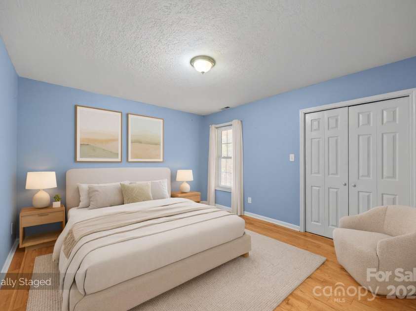 73 Waters Road, Asheville, NC 28805.  MLS# CAR4272719, YatesRealty ID 33907. Guest Bedroom #1: Bright, spacious retreat with warm floors and serene natural light.