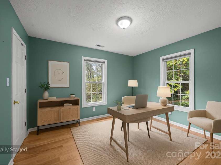 73 Waters Road, Asheville, NC 28805.  MLS# CAR4272719, YatesRealty ID 33907. Guest Bedroom #2: Peaceful corner room with natural light, perfect for a serene home office.