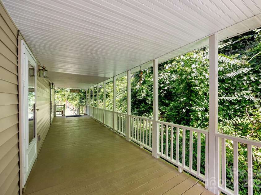 73 Waters Road, Asheville, NC 28805.  MLS# CAR4272719, YatesRealty ID 33907. Read Covered Porch provides ample privacy, leading into the Fenced-In Backyard