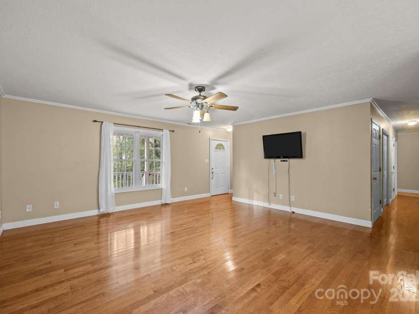 73 Waters Road, Asheville, NC 28805.  MLS# CAR4272719, YatesRealty ID 33907. Warm, light-filled haven built for effortless comfort and connection.