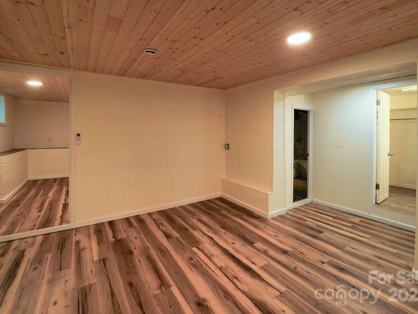 107 Riverview Drive, Asheville, NC 28806.  MLS# CAR4275298, YatesRealty ID 33909. Basement Flex Space