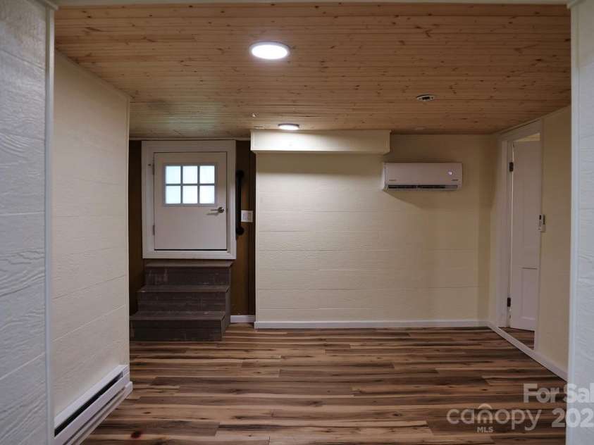 107 Riverview Drive, Asheville, NC 28806.  MLS# CAR4275298, YatesRealty ID 33909. Basement Flex Space