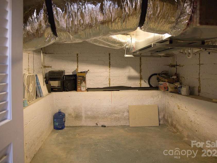 107 Riverview Drive, Asheville, NC 28806.  MLS# CAR4275298, YatesRealty ID 33909. Basement Storage Room