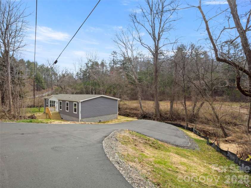2095 Emmas Grove Road, Fairview, NC 28730.  MLS# CAR4362108, YatesRealty ID 33909. 