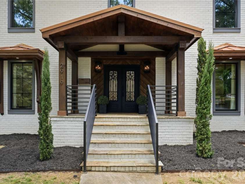 2919 Colony Road, Charlotte, NC 28211.  MLS# CAR4391510, YatesRealty ID 33916. Custom Wrought Iron front door.