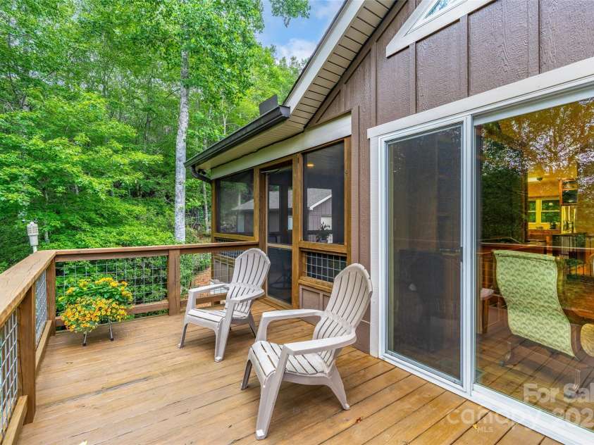 55 Lake Drive, Fairview, NC 28730.  MLS# CAR4272386, YatesRealty ID 33918. Excellent gathering spot just outside screened porch and living room