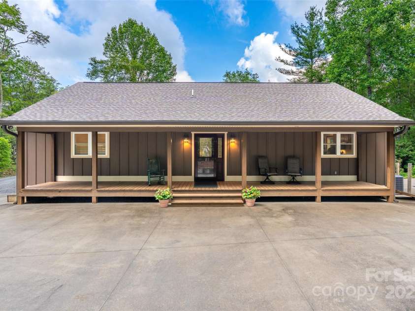 55 Lake Drive, Fairview, NC 28730.  MLS# CAR4272386, YatesRealty ID 33918. Front of home with ez parking at front door